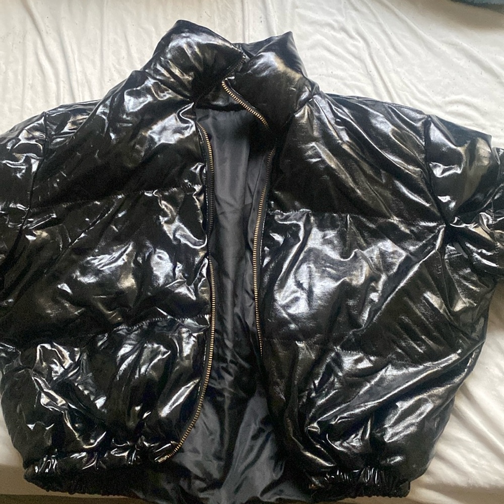 This is a PRETTYLITTLETHING leather puff jacket it’s a size medium